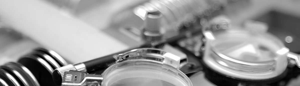 A black and white photo of a lens laboratory